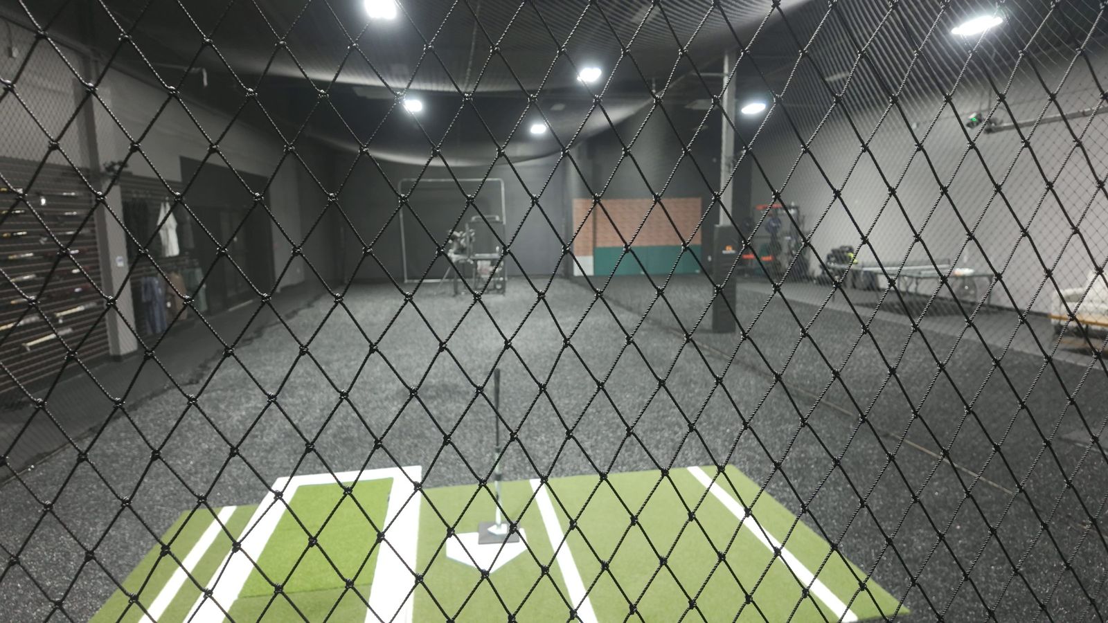 The hitting cage seen through the netting