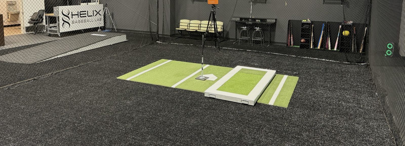 Force plate set into the turf at the plate