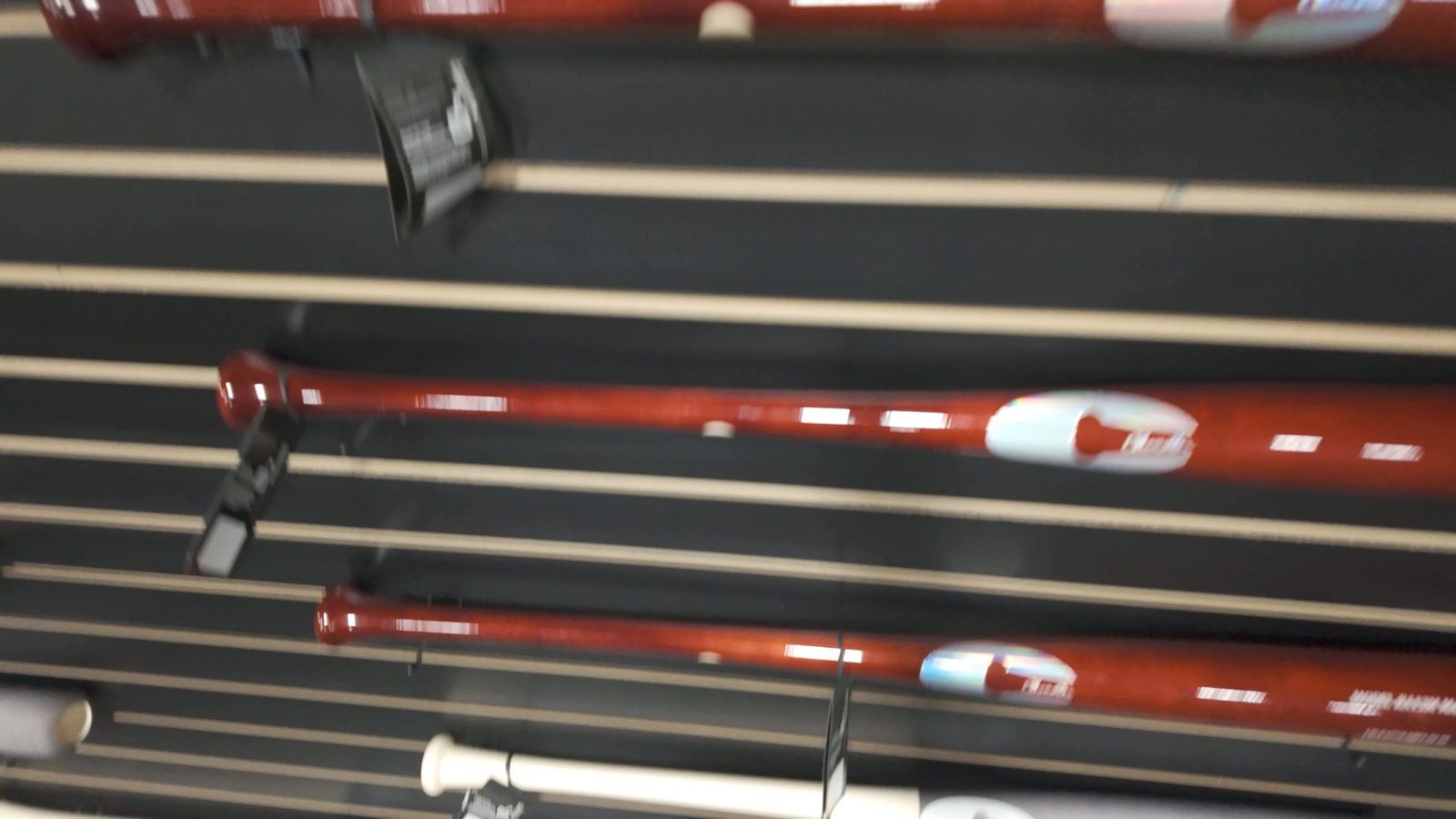 Wood bats on the bat wall